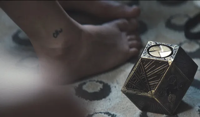Odessa A'zion showing bare feet beside a decorative box.