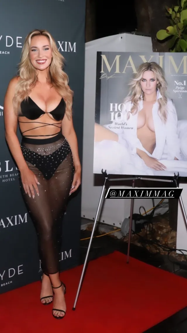Paige Spiranac wearing black heeled sandals and a sheer skirt beside a magazine display.