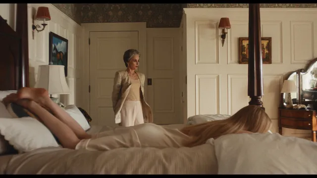 Sarah Pidgeon appearing barefoot in a bedroom scene.