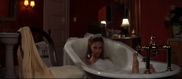 Rachel McAdams sitting in a bathtub in a screen image.