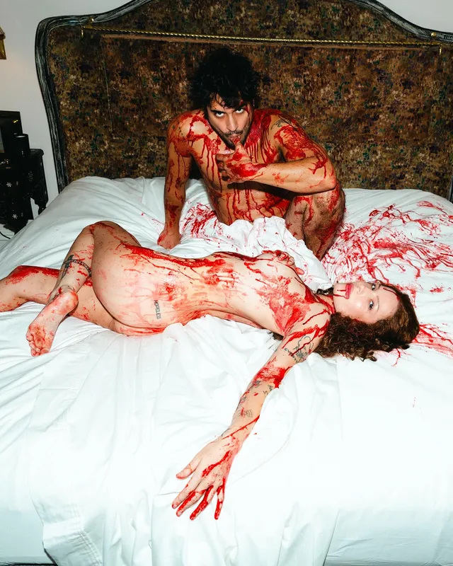 Halsey a staged horror portrait with theatrical blood.