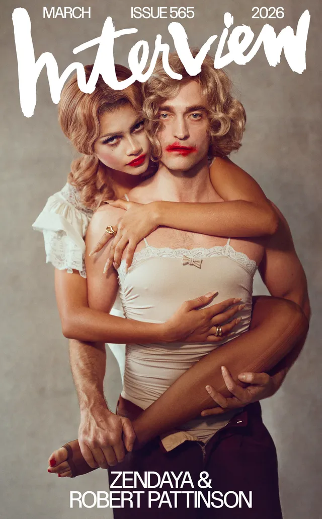 Zendaya posing beside a companion for a magazine cover.