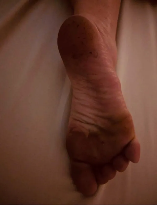 Britney Spears a close-up of a bare sole.