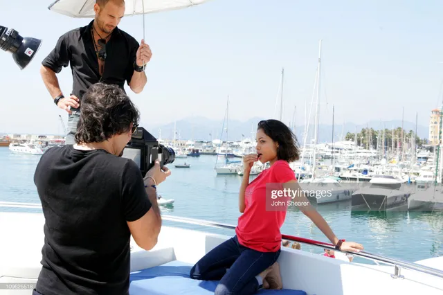 Rosario Dawson sitting on a boat during an interview.