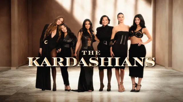 Kendall Jenner posing with four women in black outfits for a promotional photograph.