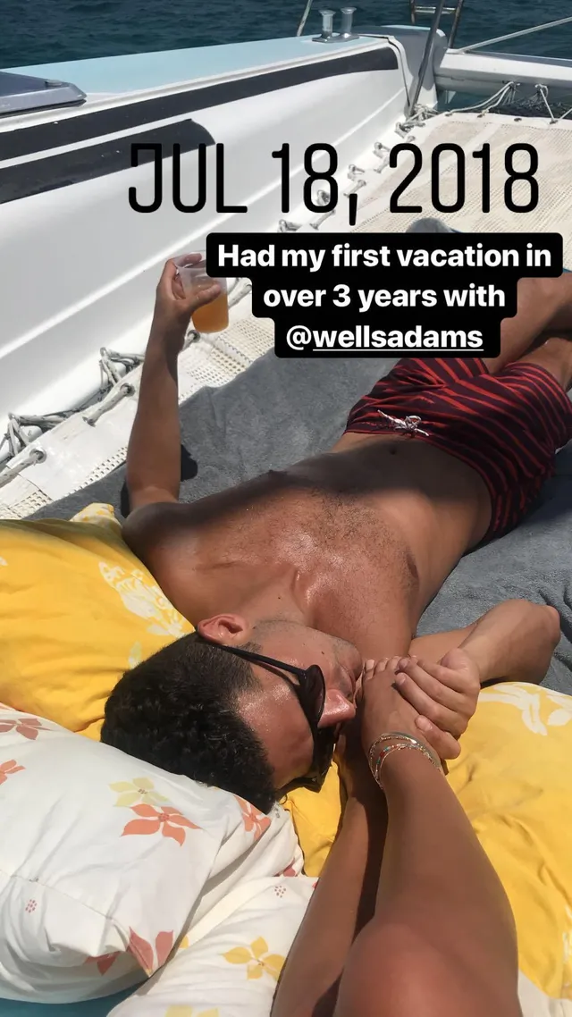 Sarah Hyland relaxing on a boat with a companion.