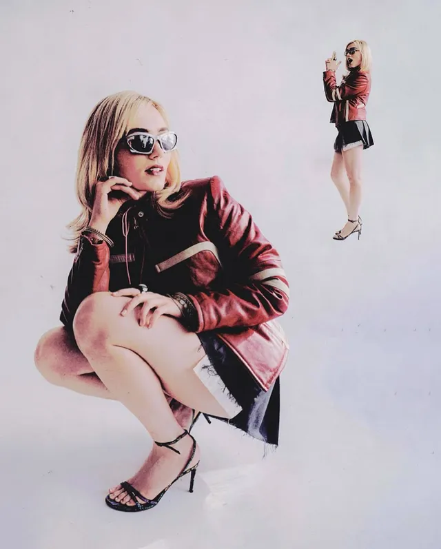 Meg Donnelly posing in a red jacket, short skirt and black heels for a studio collage.