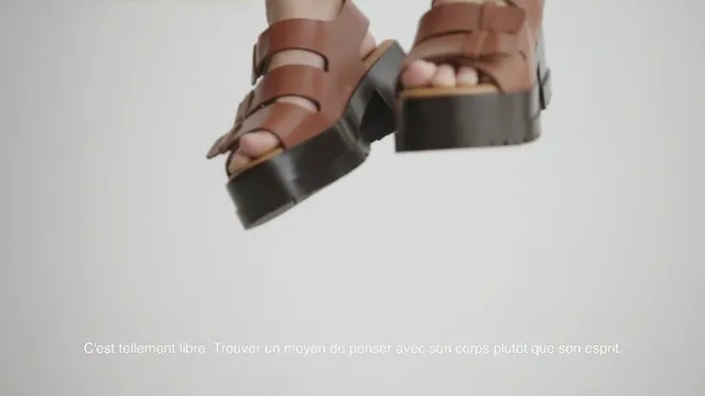 Havana Rose Liu showing brown platform sandals.