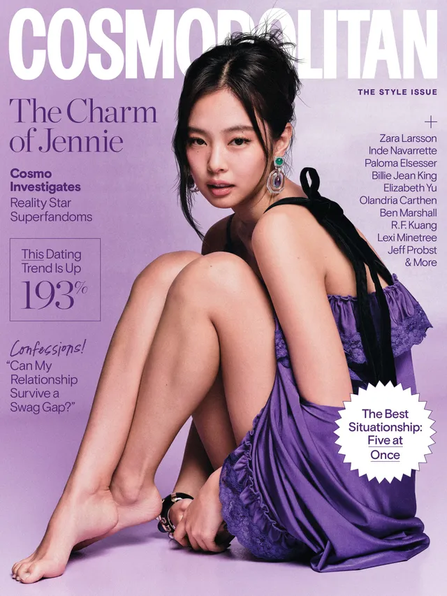Jennie Kim sitting barefoot in a purple dress on a magazine cover.