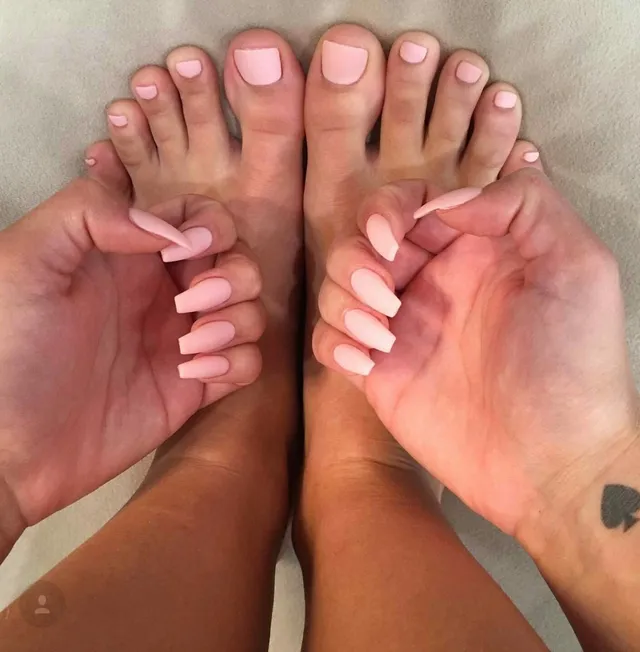 Ariel Winter a close-up of painted toenails and hands.