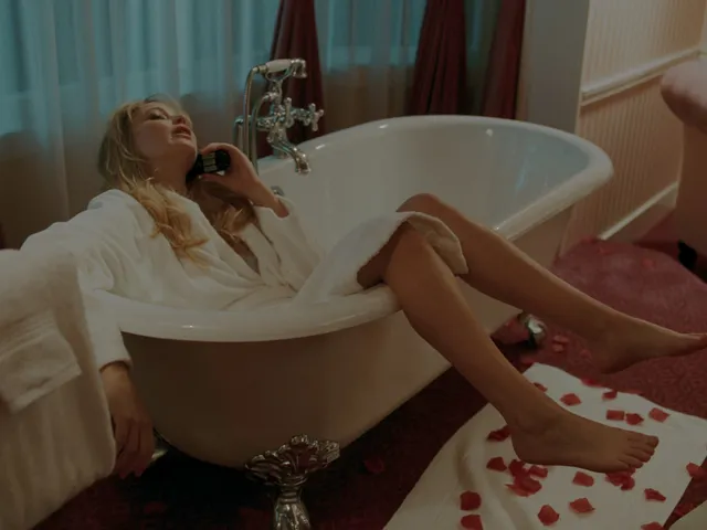 Jennifer Lawrence resting bare feet on the edge of a bathtub.