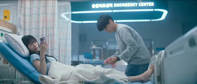 Bae Suzy lying barefoot on a hospital bed in a scene.