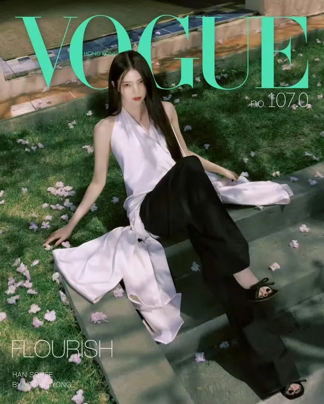 Han So-hee posing outdoors in black heels.