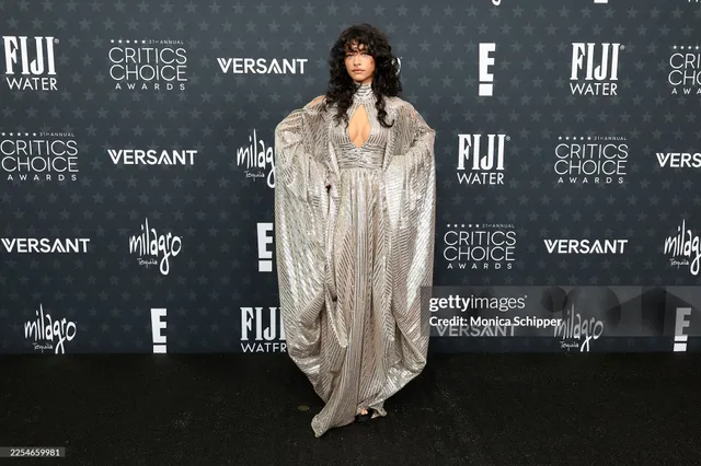 Odessa A'zion wearing a silver outfit at an awards event.