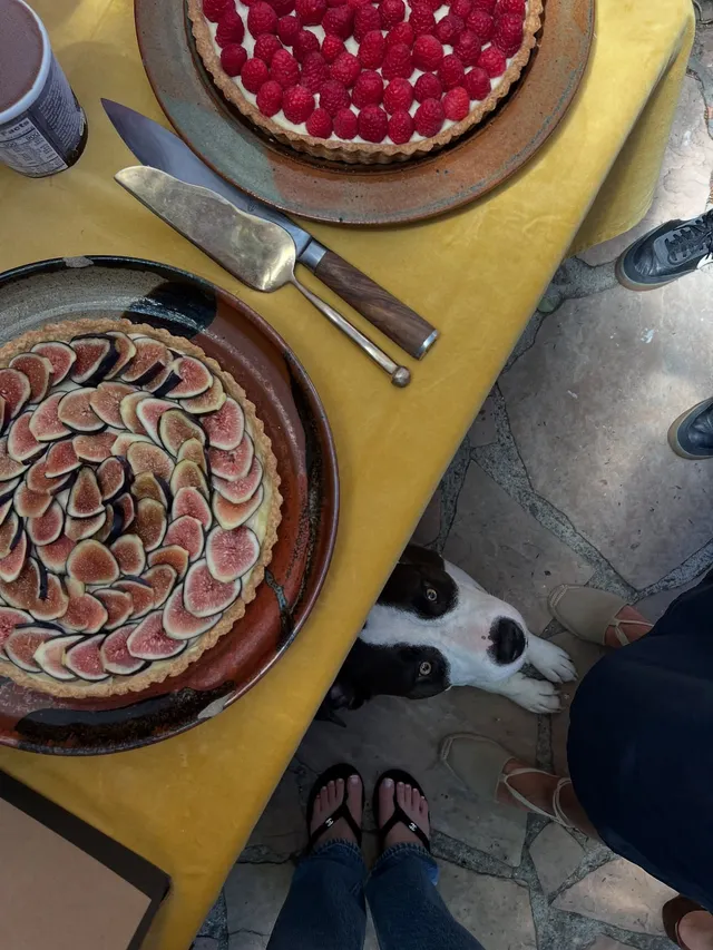 Alycia Debnam-Carey a casual view of flip-flops beside a table.