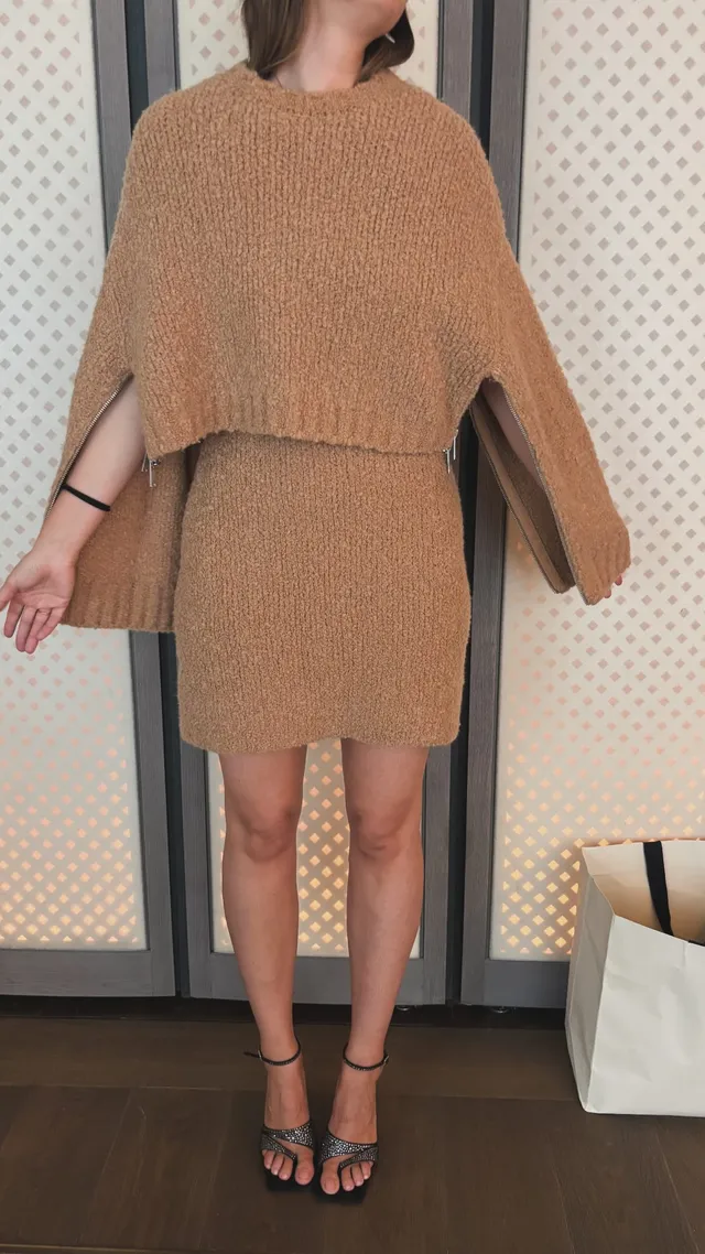 Maria Sharapova wearing heeled sandals with a tan knit top and skirt.