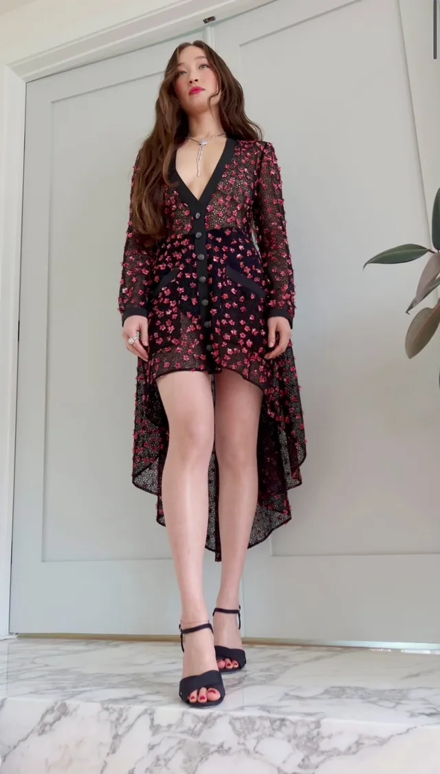 Havana Rose Liu wearing a floral dress and black heels.