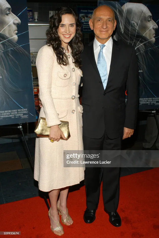 Jennifer Connelly posing with a companion at a film premiere.