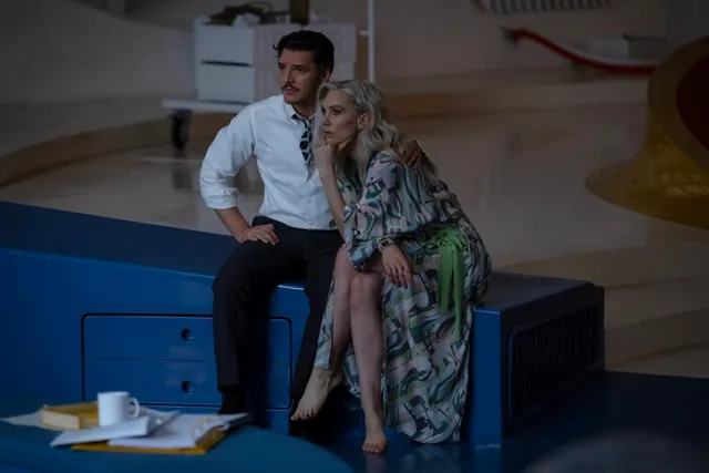 Vanessa Kirby a seated screen scene beside a companion.
