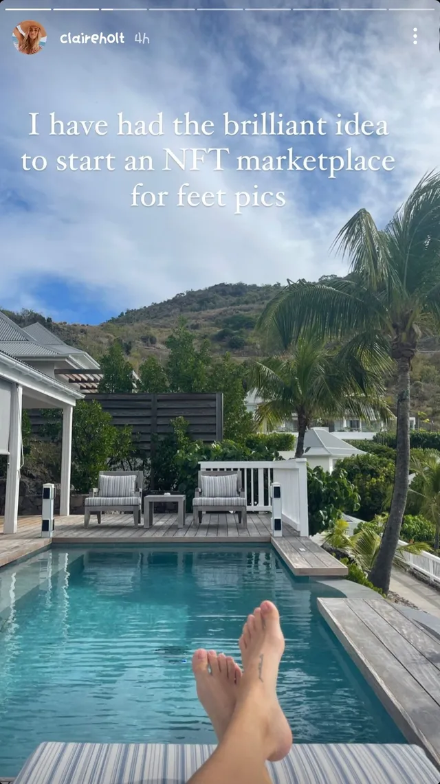 Claire Holt relaxing beside a swimming pool.