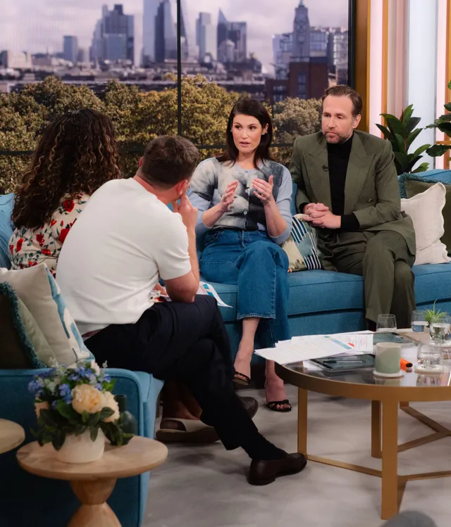 Gemma Arterton speaking with guests on a television set.