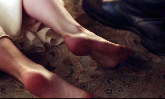 Adelaide Kane a close-up of bare feet during a screen scene.