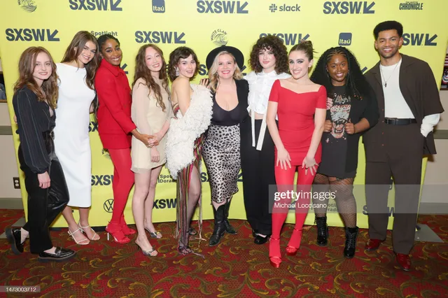 Havana Rose Liu standing with cast members at a film festival in heels.