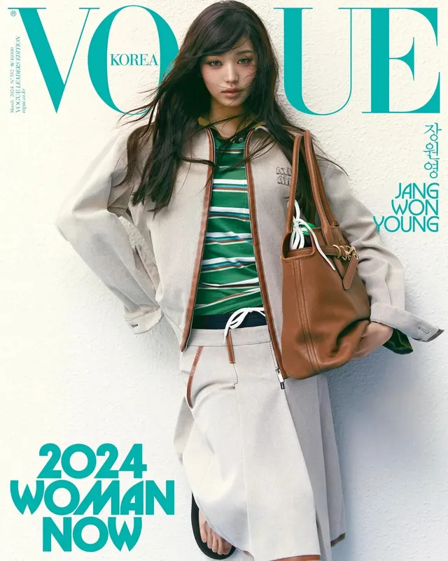 Jang Wonyoung posing in a layered outfit for a magazine cover.