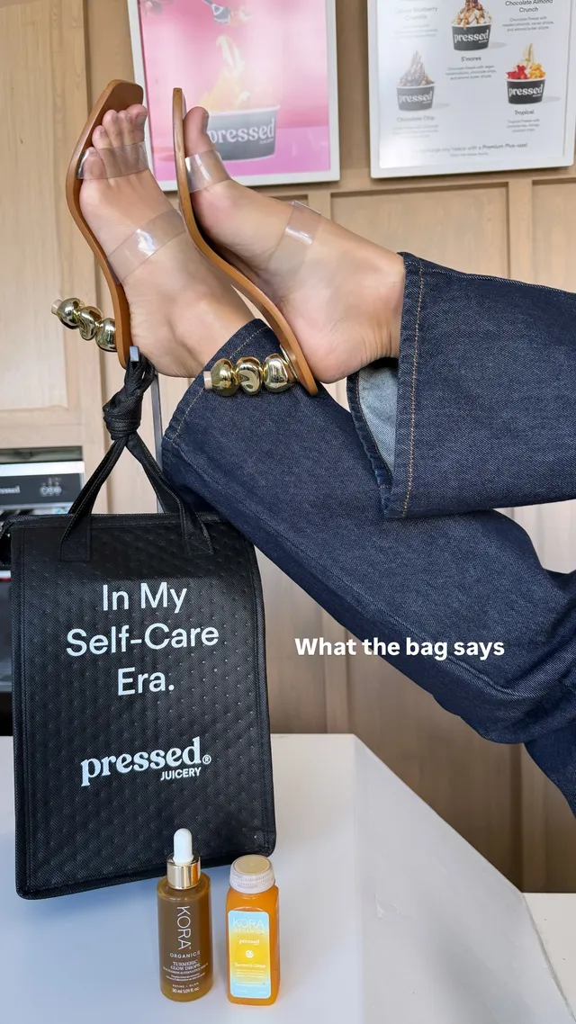 Miranda Kerr raised bare feet during a self-care moment.