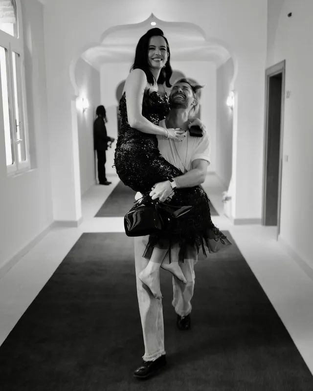 Eva Green a monochrome backstage scene with a colleague.