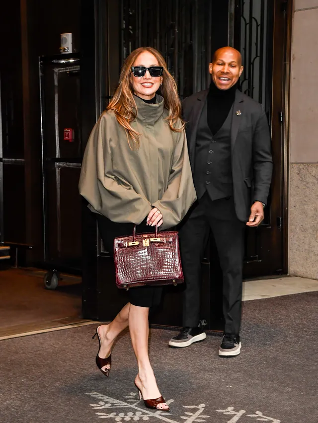 Jennifer Lopez a casual street portrait with open-toe heels.