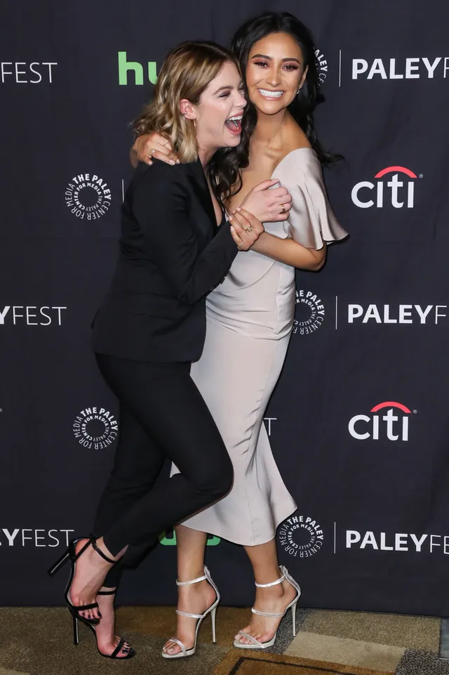Ashley Benson posing with a companion at PaleyFest.
