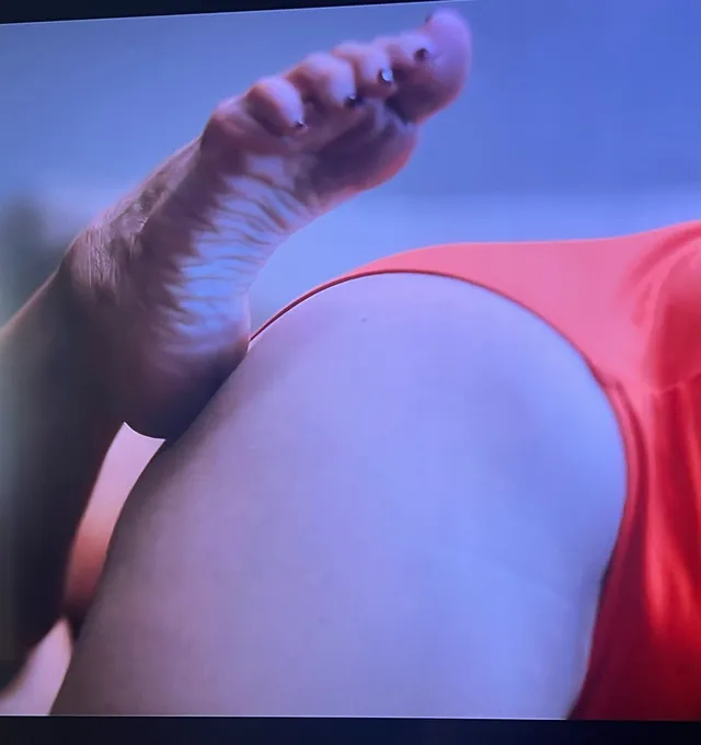 Brittany Snow a close-up of a bare foot during a screen scene.