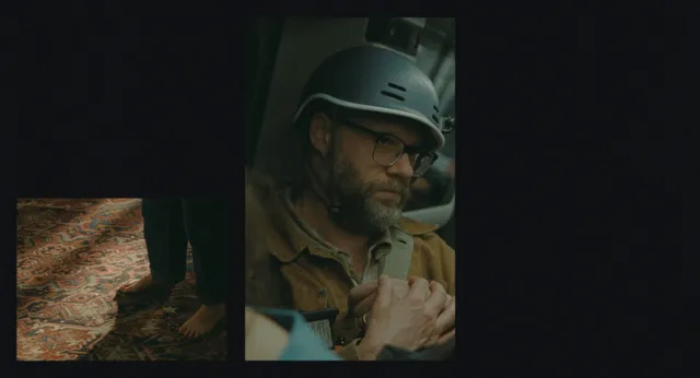 Olivia Wilde appearing beside another person in a dimly lit film scene.