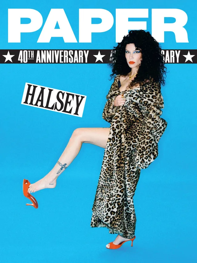 Halsey a fashion cover with a raised red heel.