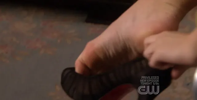 Leighton Meester a close-up of bare feet during a screen scene.