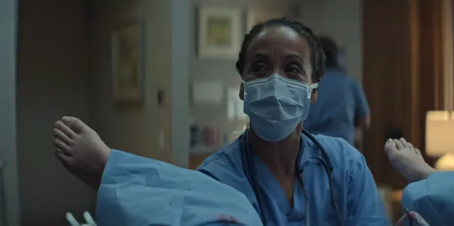 Victoria Pedretti resting during a hospital screen scene.