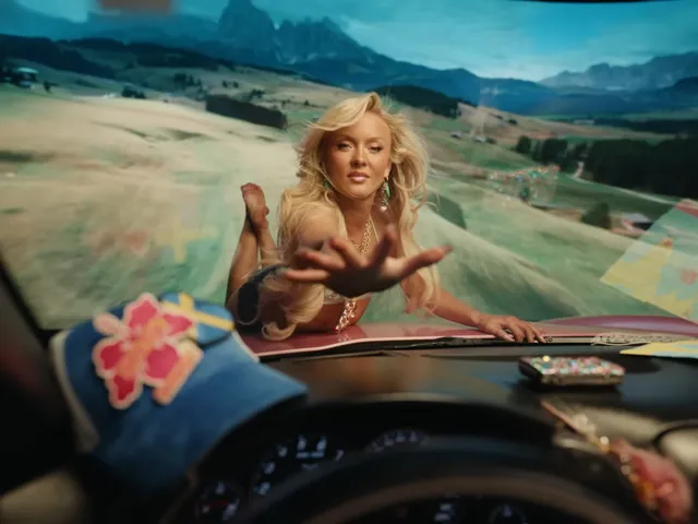Zara Larsson posing on a surfboard in front of a car.