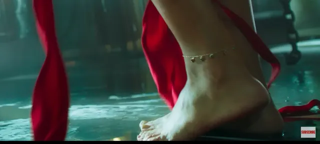 Disha Patani showing her bare foot and anklet during a close-up screen scene.