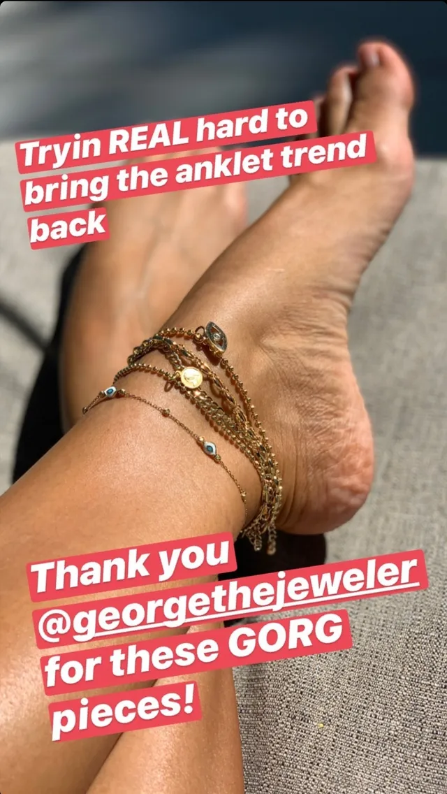 Sarah Hyland a close-up of bare feet with ankle jewelry.