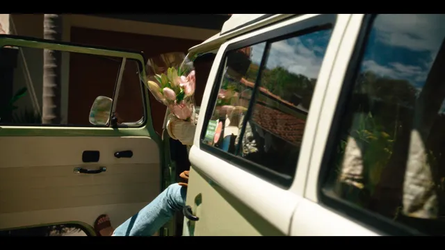 Alycia Debnam-Carey sitting in a vehicle during a screen scene.