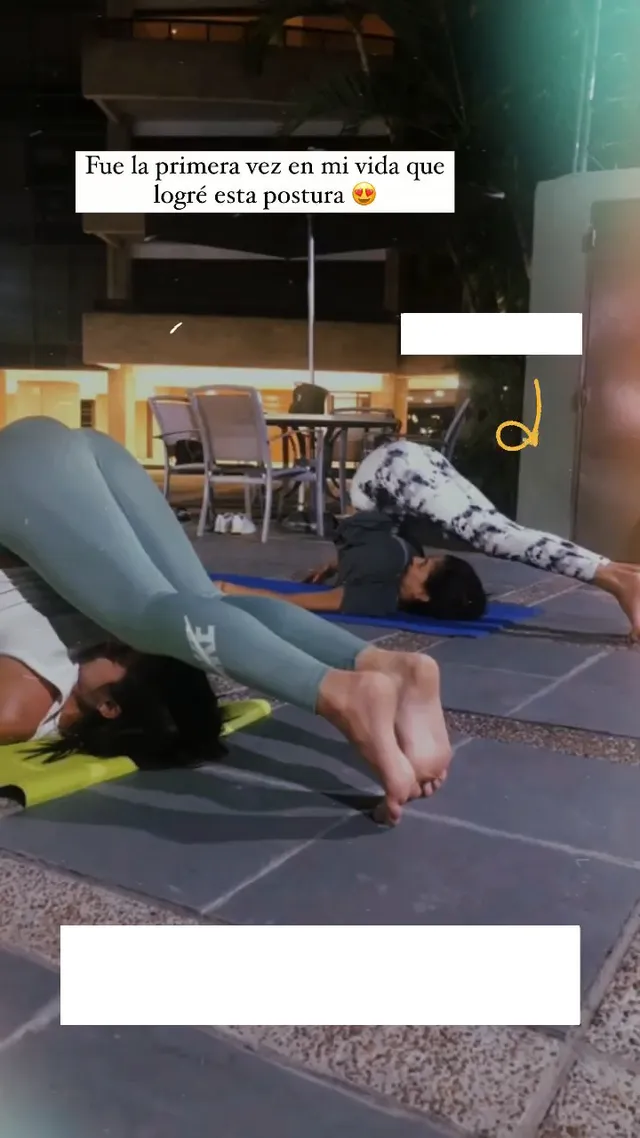 María Gabriela de Faría stretching barefoot on a gym mat.