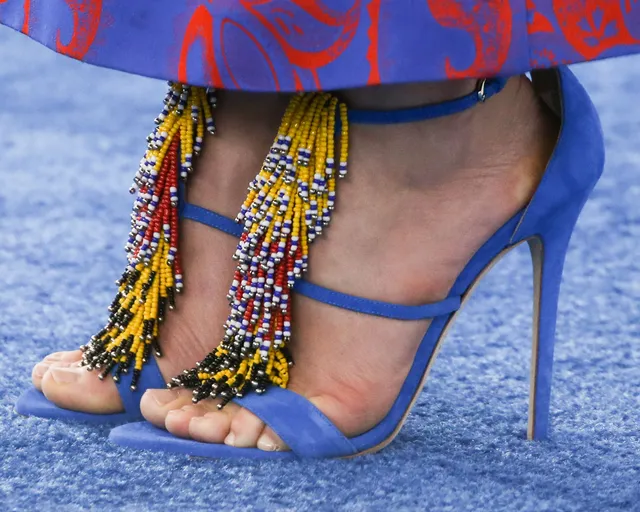 Jessica Biel a close detail of colourful blue heels.