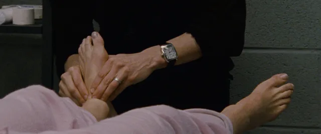Natalie Portman resting a bare foot in a close-up screen scene.