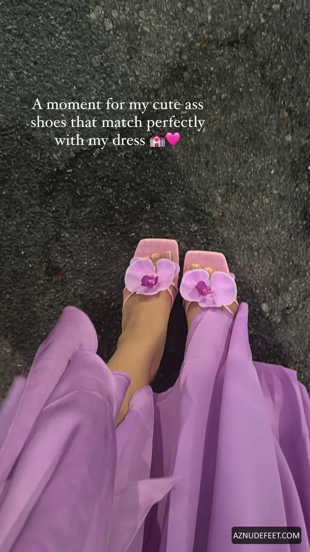 Cierra Ramirez showing pink platform sandals beneath a purple dress.